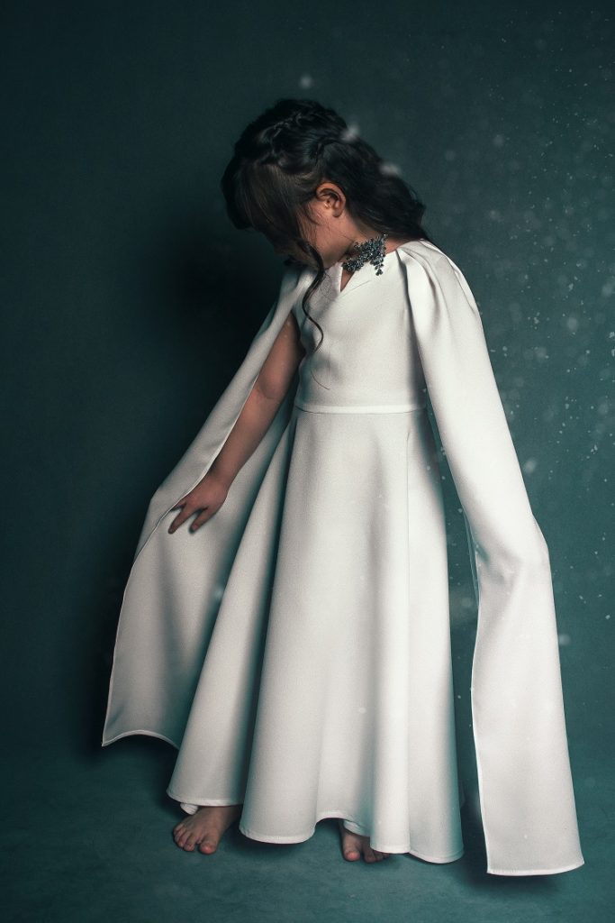 Photo by Hamid Tajik: https://www.pexels.com/photo/beautiful-little-kid-in-white-dress-with-cape-5960128/